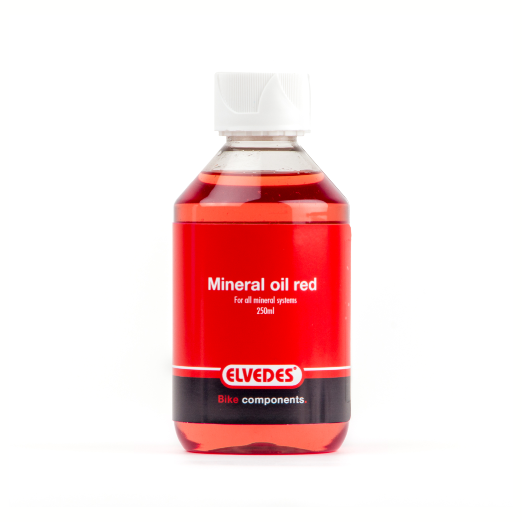 Elvedes minerale olie voor alle minerale remsystemen. Flacon 250ml, kleur rood